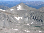 That is Pacific Peak just to the northwest.  Notice the small, unnamed lake just below its' summit behind the ridge.  The unnamed lake prominent in this image sits at an elevation of 12,695 feet.